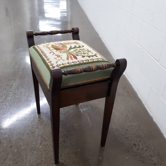 Cushion tapestry repurposed for seat of Victorian piano stool. / Coussin brodé reconverti en siège pour tabouret de pian
