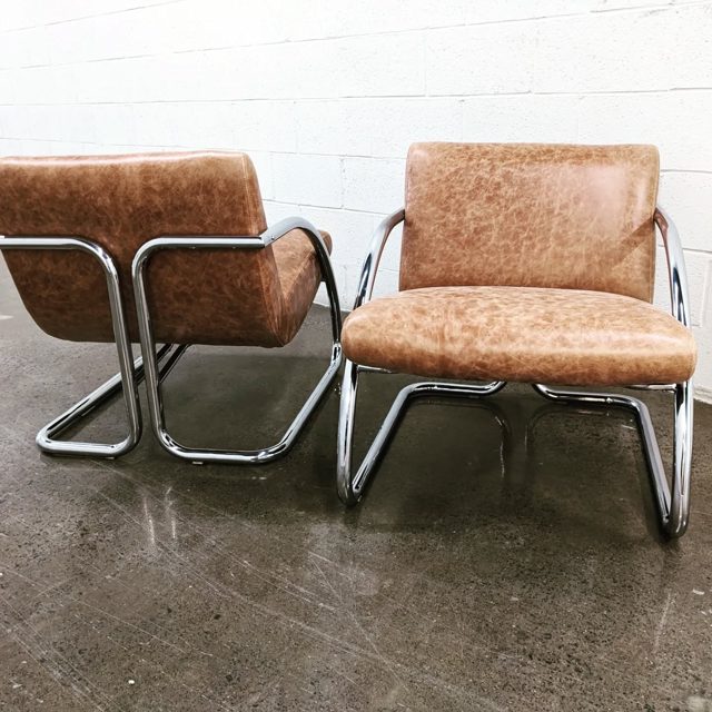 1970s lounge chairs from Cimon Montreal reupholstered in a beautiful pull up leather